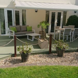 Garden deck after application of Decking Paint in Light Green by Ian Ferguson
