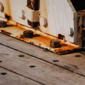 Rusted nut and bolt on stair well