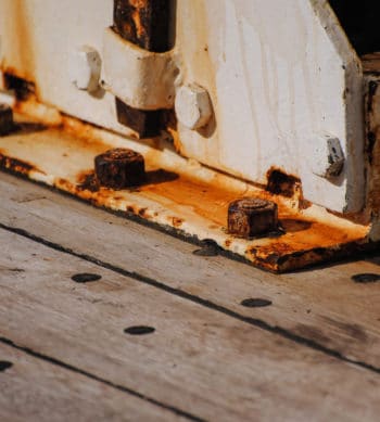 Rusted nut and bolt on stair well