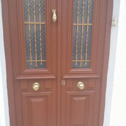 Damaged wooden front door finished with Owatrol SCS