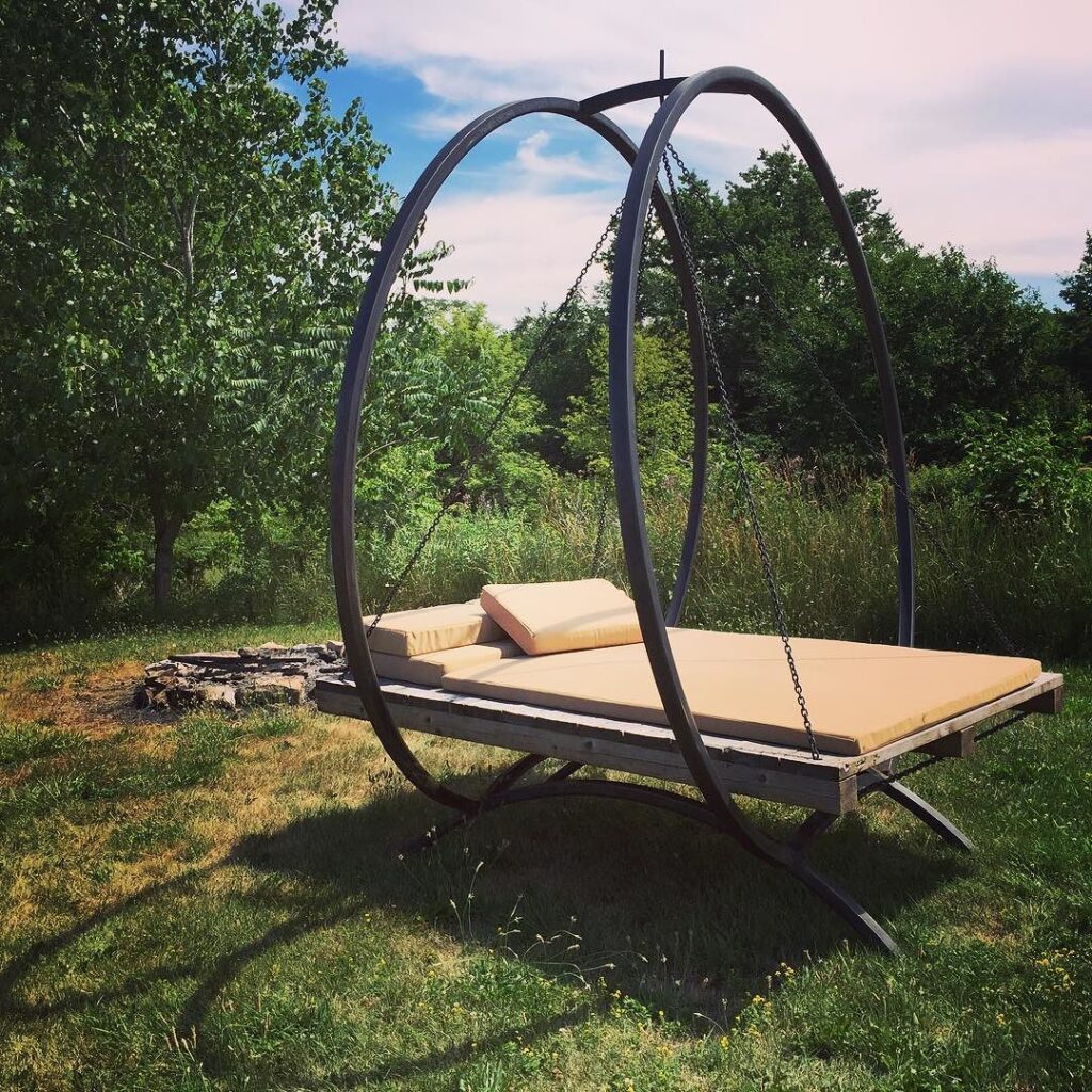 Garden swing chair made from pallets