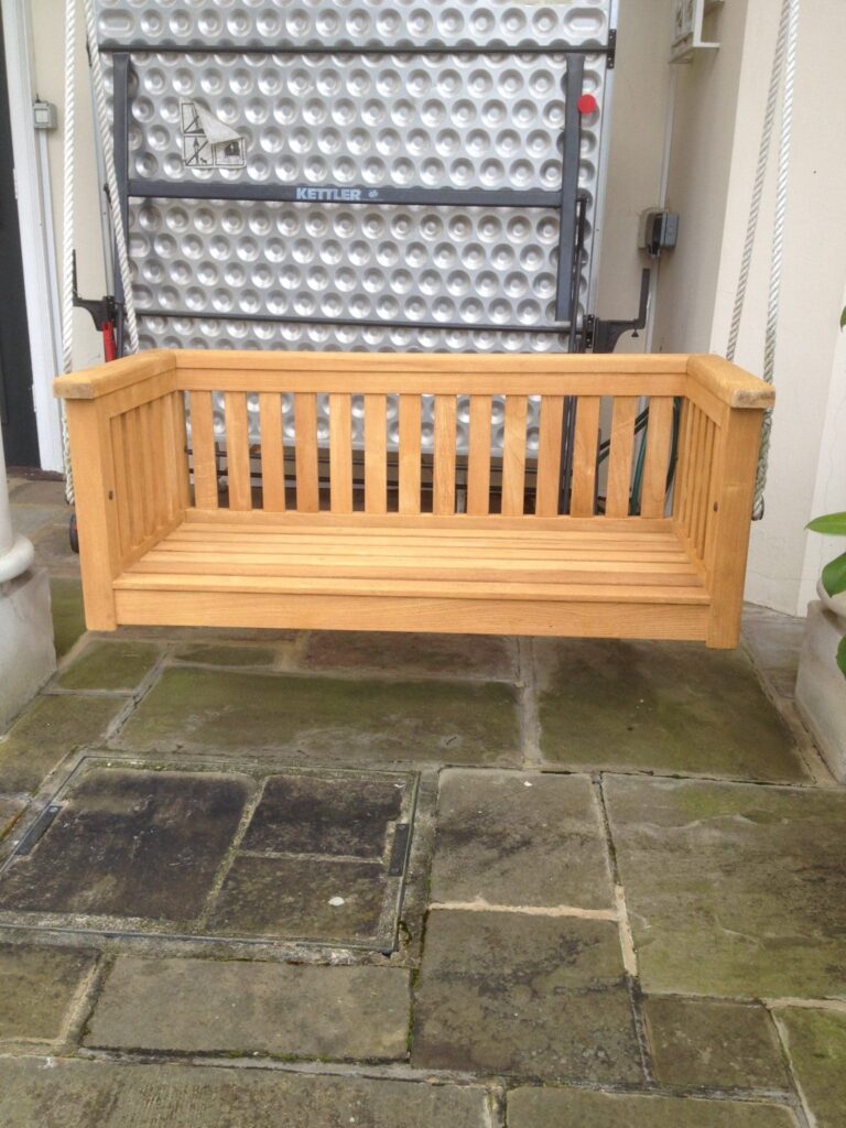 After - Garden furniture restored with Aquadecks Bench swing after application of Aquadecks