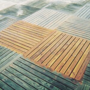 Before and after using Net-Trol on decking