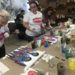 Paint pouring artist uses Floetrol at an event