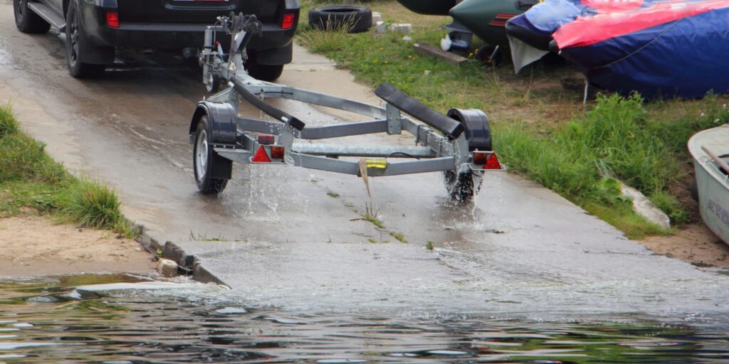 Boat trailer coming out of the water