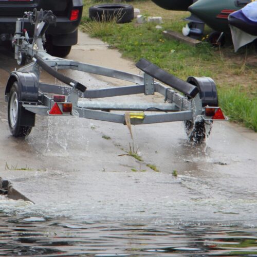 Boat trailer coming out of the water