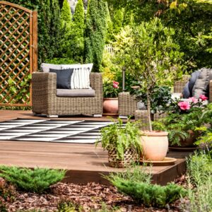 Plants surrounding a garden deck