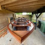 Between coats of Deks Olje D1 on Moats boat