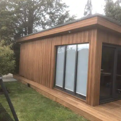 Cedar clad garden office and deck finished with Owatrol by R&A Pressure Washing Ltd