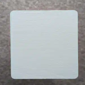 Aged Grey Decking Paint swatch - applied to new pine wood in natural lighting.