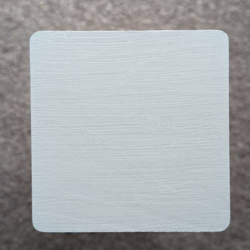 Aged Grey Decking Paint swatch - applied to new pine wood in natural lighting.