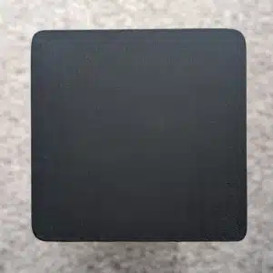 Black Decking Paint swatch - applied to new pine wood in natural lighting.