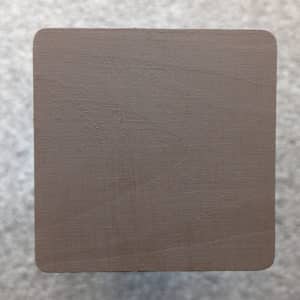 Dark Brown Decking Paint swatch - applied to new pine wood in natural lighting.