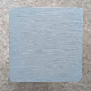 Grey Decking Paint swatch - applied to new pine wood in natural lighting.