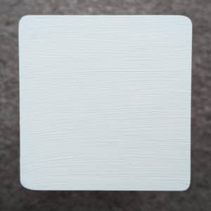 Light Grey Decking Paint swatch - applied to new pine wood in natural lighting.