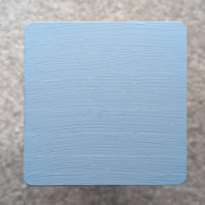Shale Decking Paint swatch - applied to new pine wood in natural lighting.