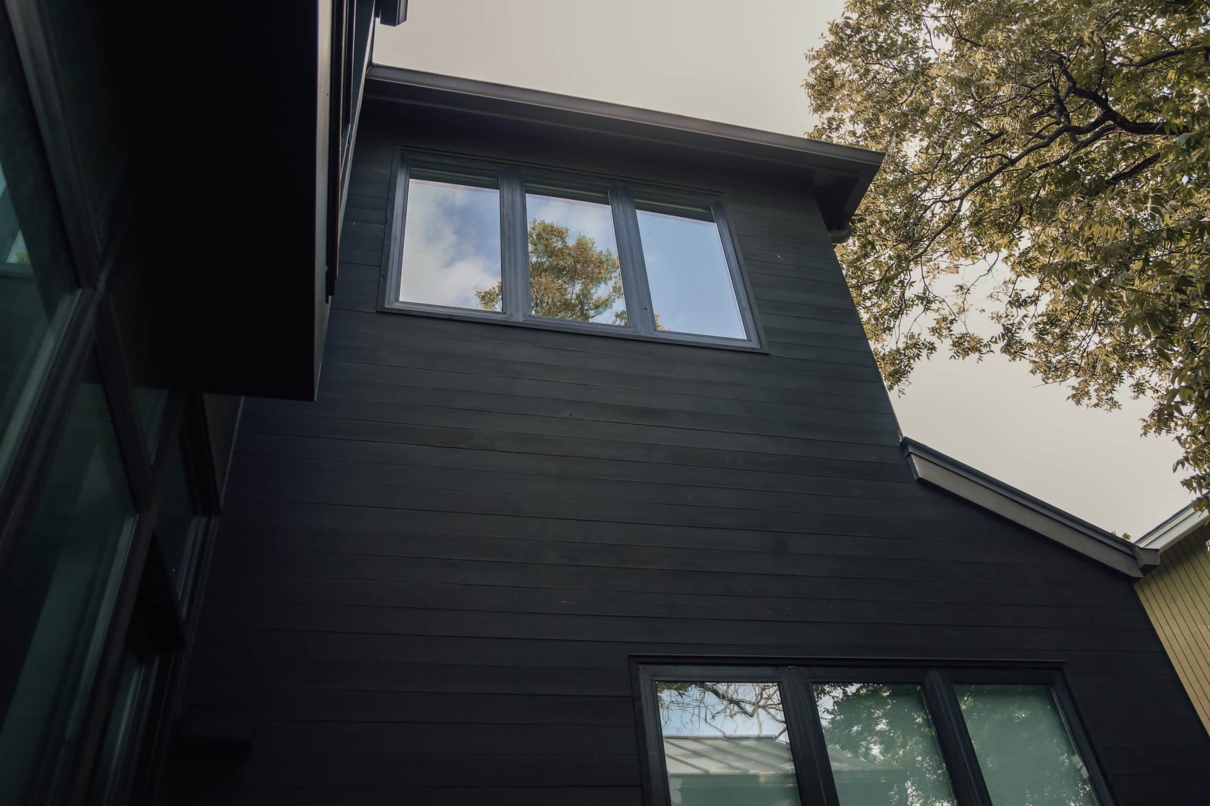 House exterior cladding painted black