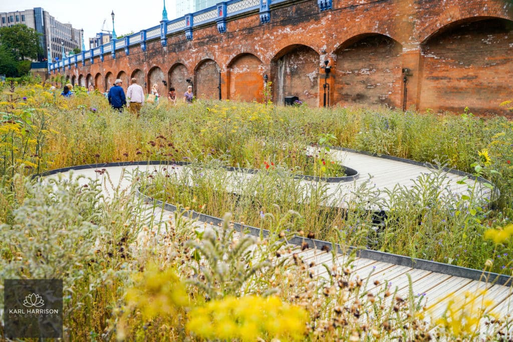 Beautiful London Superbloom with curved deck. Image credit to Karl Harrison Landscapes.