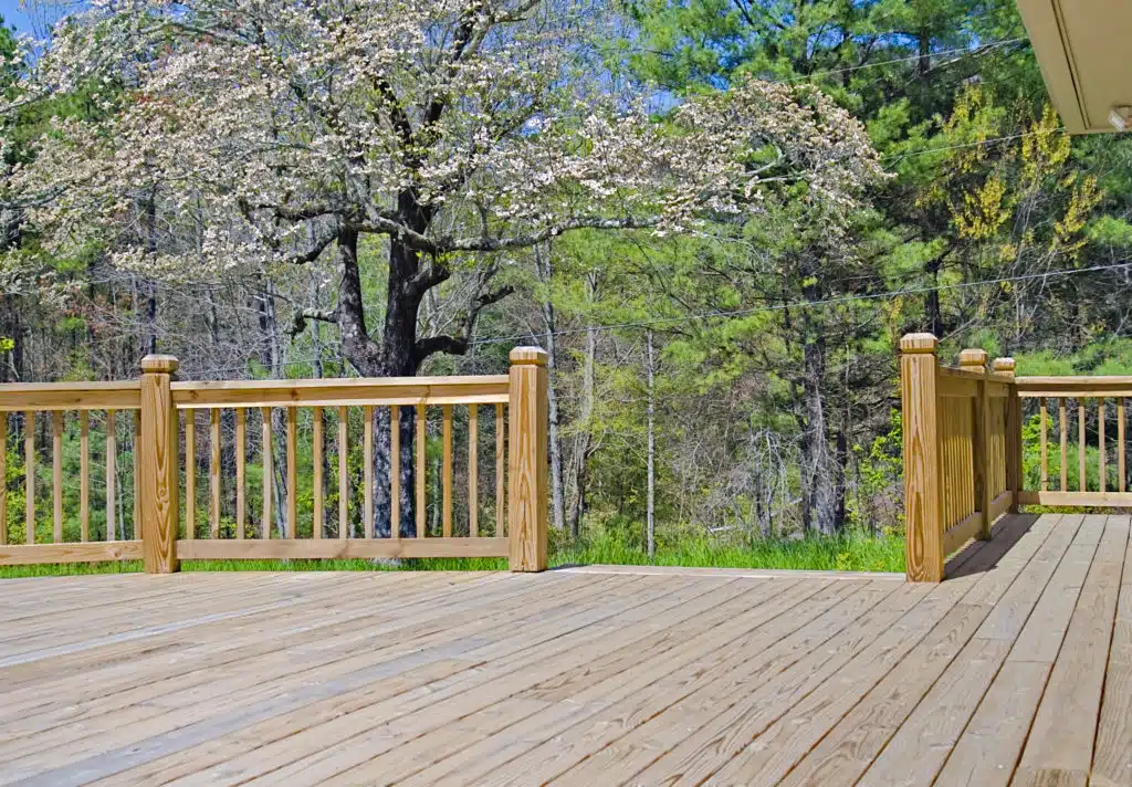 Large clear garden deck with no furniture